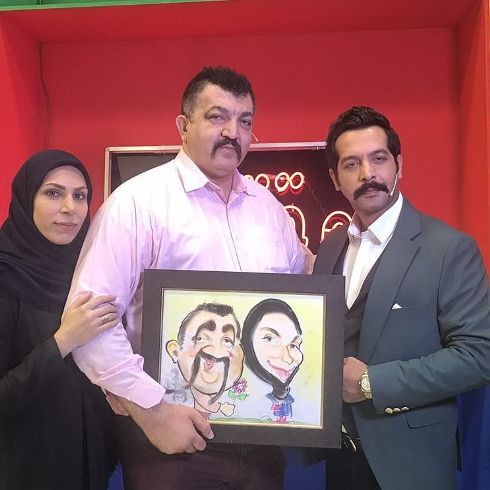 احمد ایراندوست در کنار همسرش و کامران تفتی