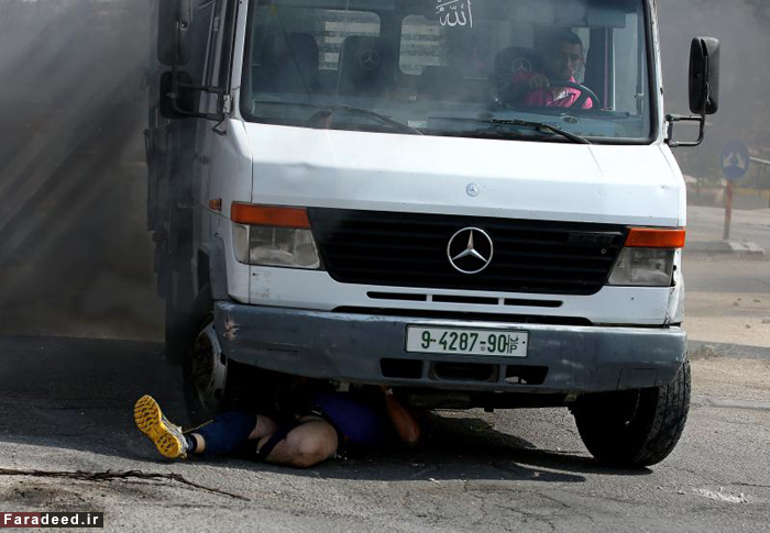 (تصاویر) زیرگرفتن چماقدار اسرائیلی با کامیون