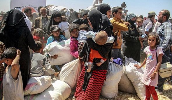 تصاویر : فرار هزاران سوری به خاک ترکیه
