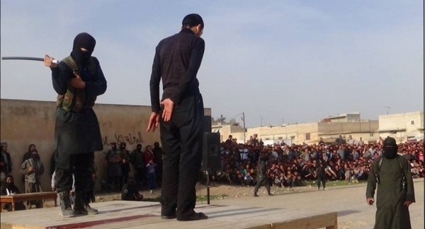 داعشی‎ها یک نوجوان را شلاق زدند/عکس