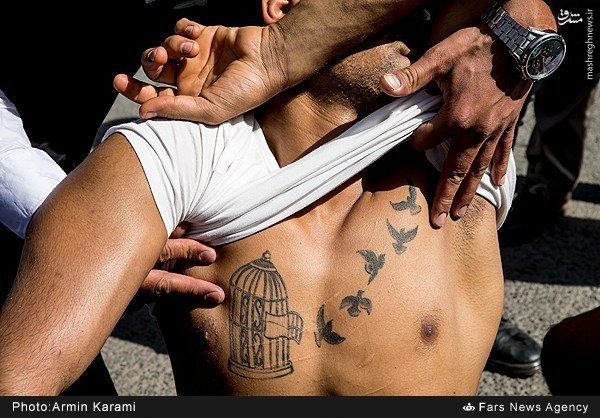 عکس/ خالکوبی عجیب روی سینه یک سارق