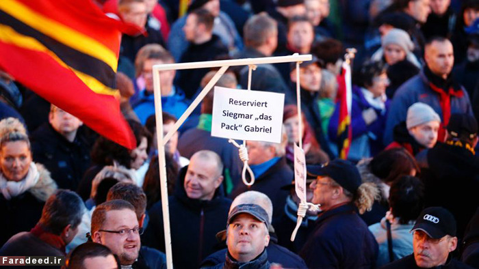 (تصاویر) راهپیمایی علیه مرکل و مهاجران